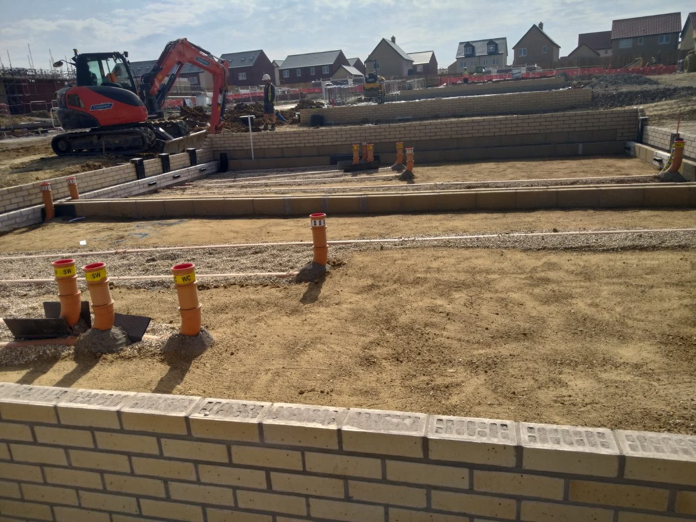 Brick foundations with the working area swept and clear